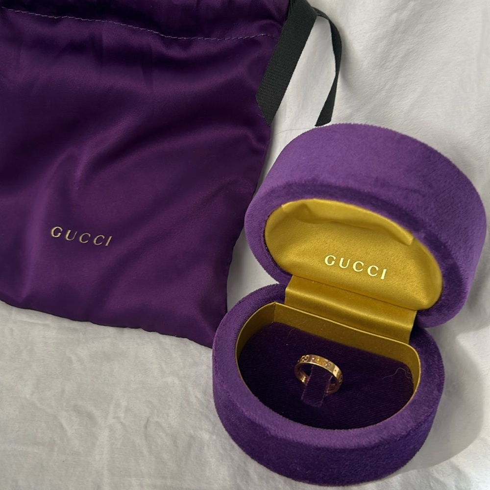 GUCCI solid 18-karat gold
ring size 6